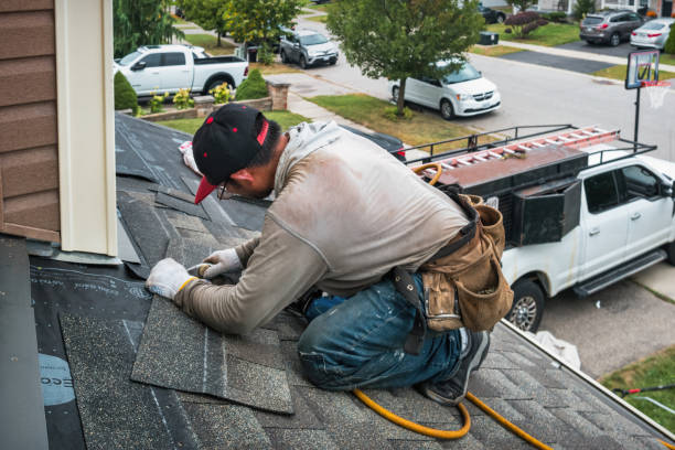 Professional Roof Replacement technician working in Le Roy, NY